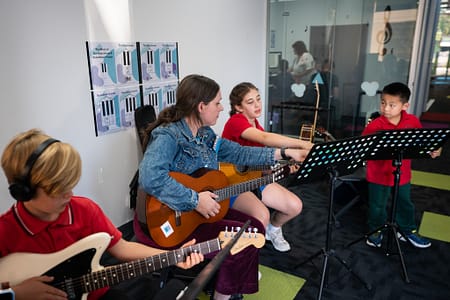 Guitar 3 kids with Yolanda Guitar