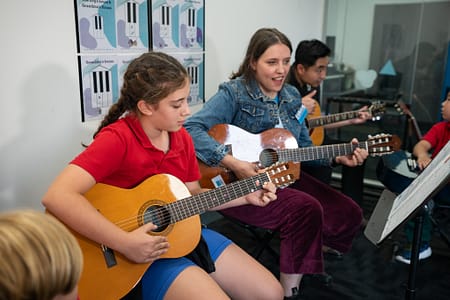 Guitar Mina Yolanda w Jason (dad) in bg Guitar